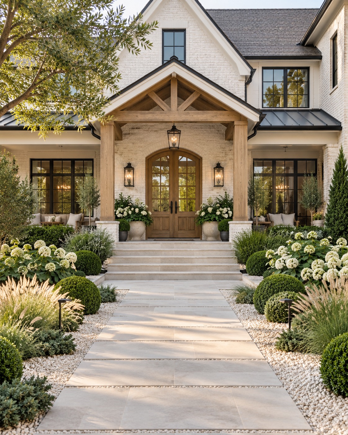 Farmhouse entry with timber portico, hydrangeas and stone pathway